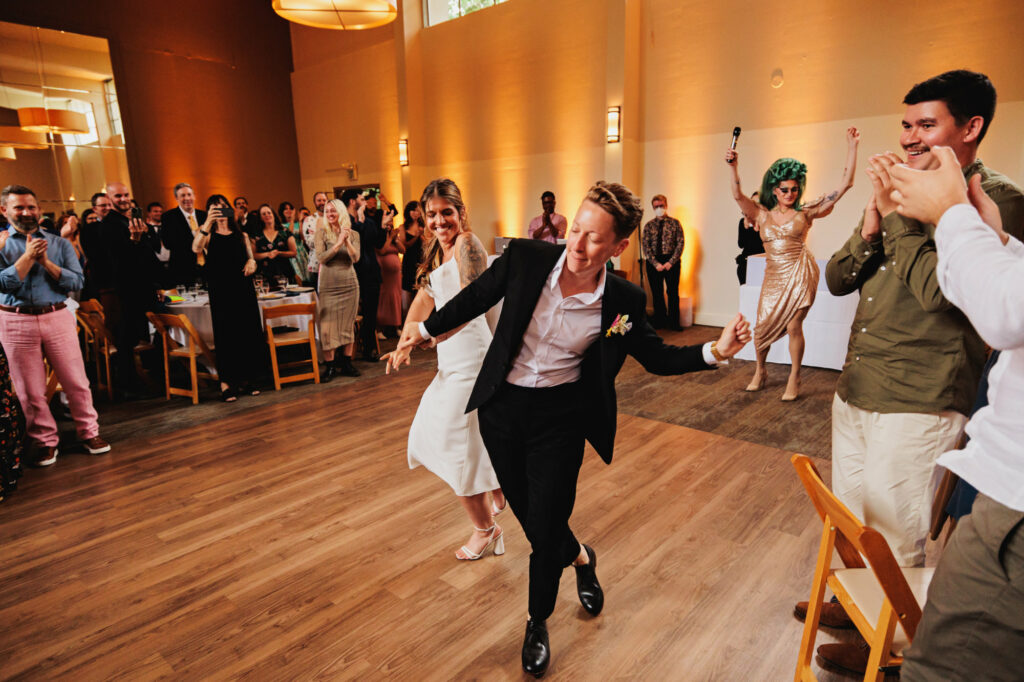 lesbian couple dance at Hall at Fauntleroy wedding