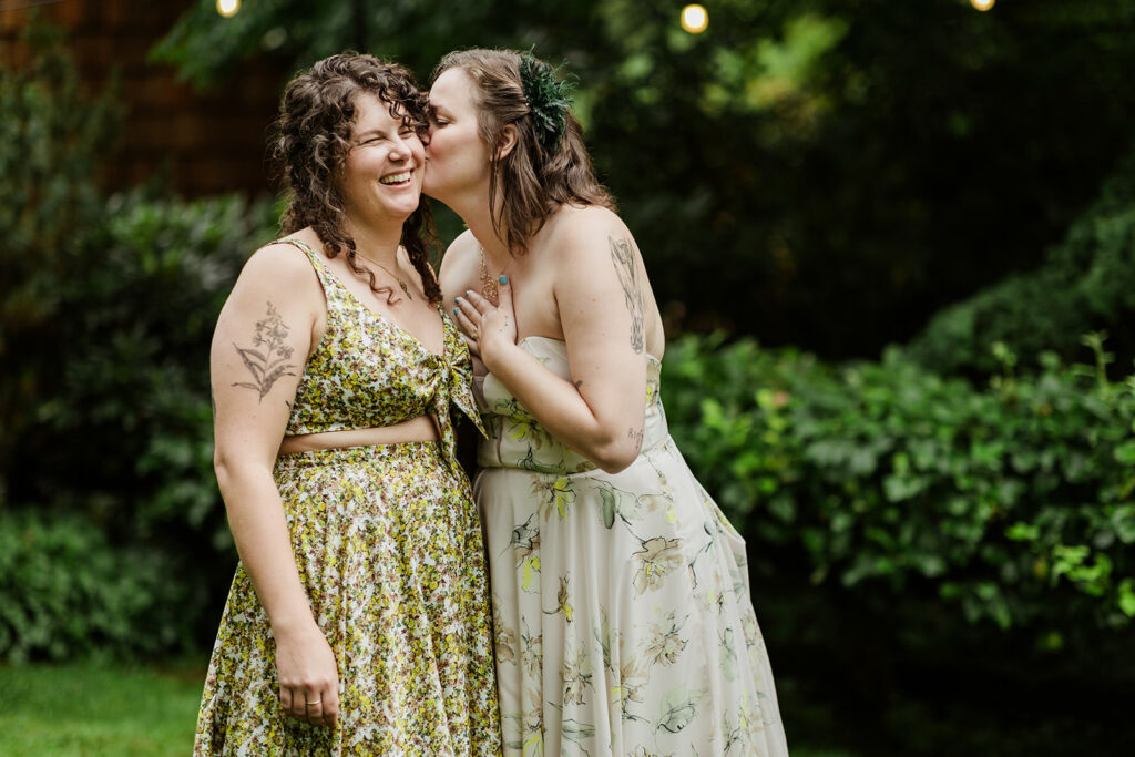 two brides in green and yellow floral dresses