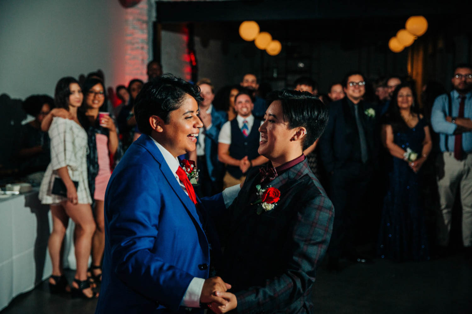 queer couple dancing at their wedding reception in Seattle