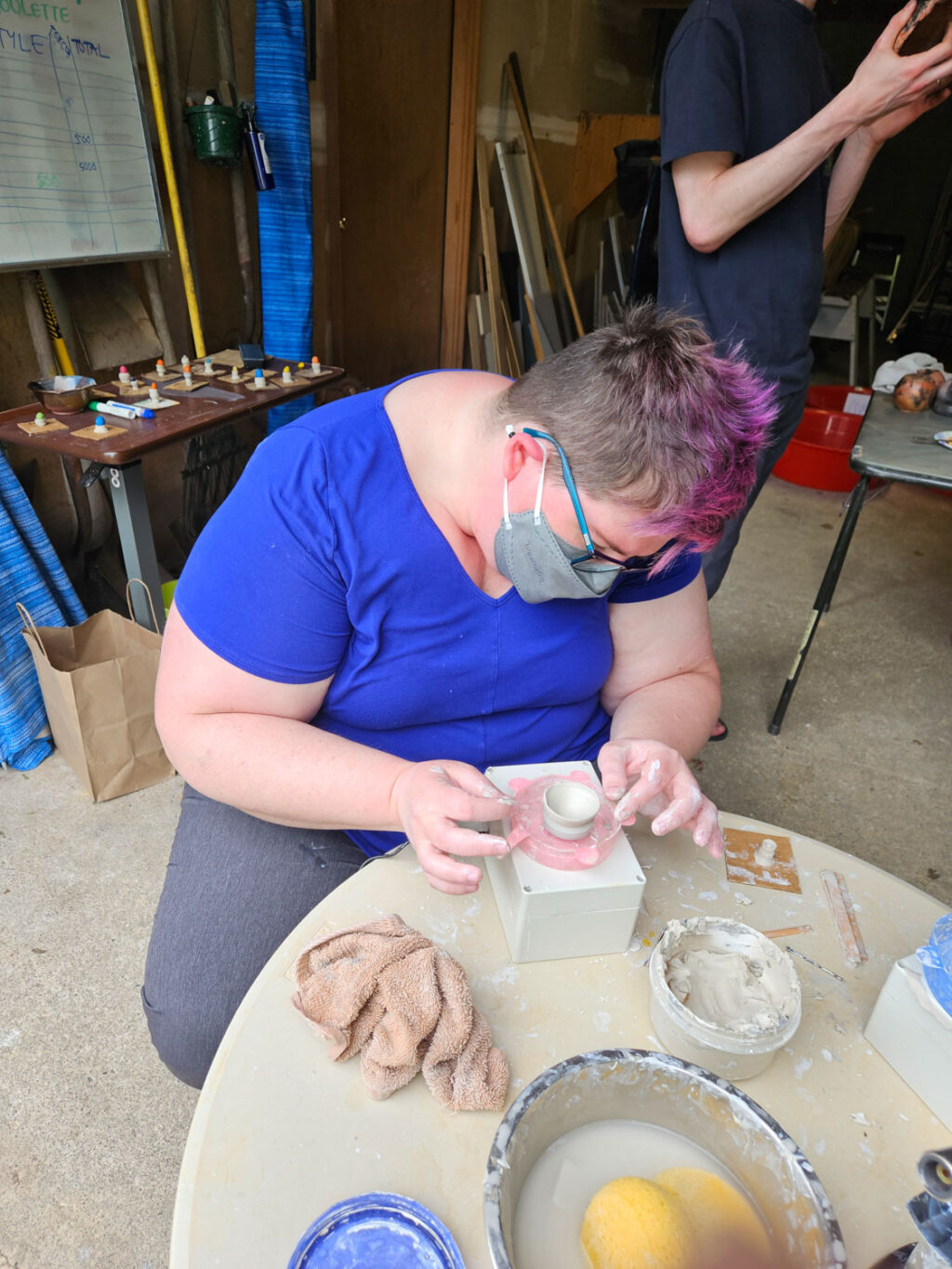 Cindy Savage, Seattle wedding planner, working on a pottery project