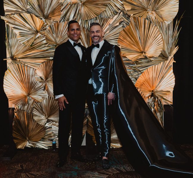 Andy and Victor at their luxury black and gold themed wedding