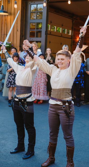 sword fight for first dance at Sid and Ren's wedding