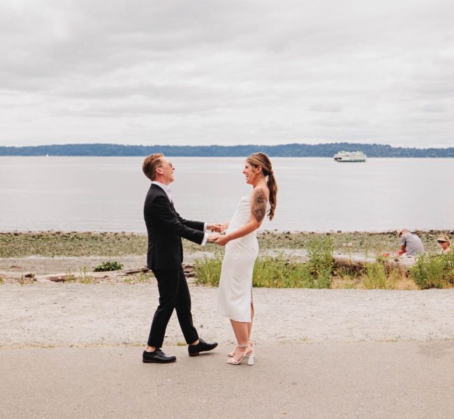 Jackie and Tracey standing in front of water in Seattle